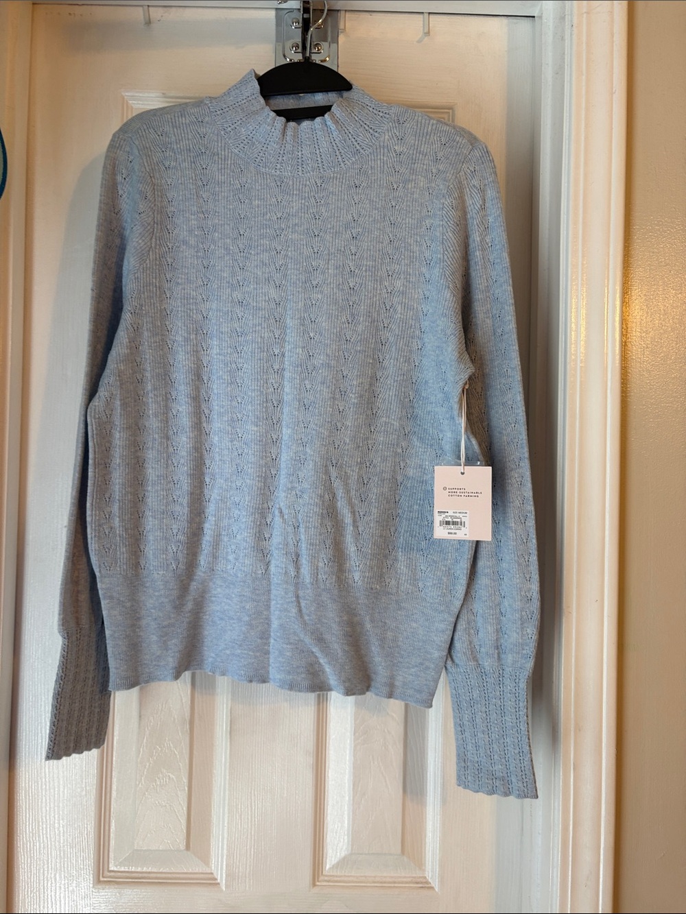 NWT Lauren Conrad women’s sweater size medium in windchill (light heather blue).